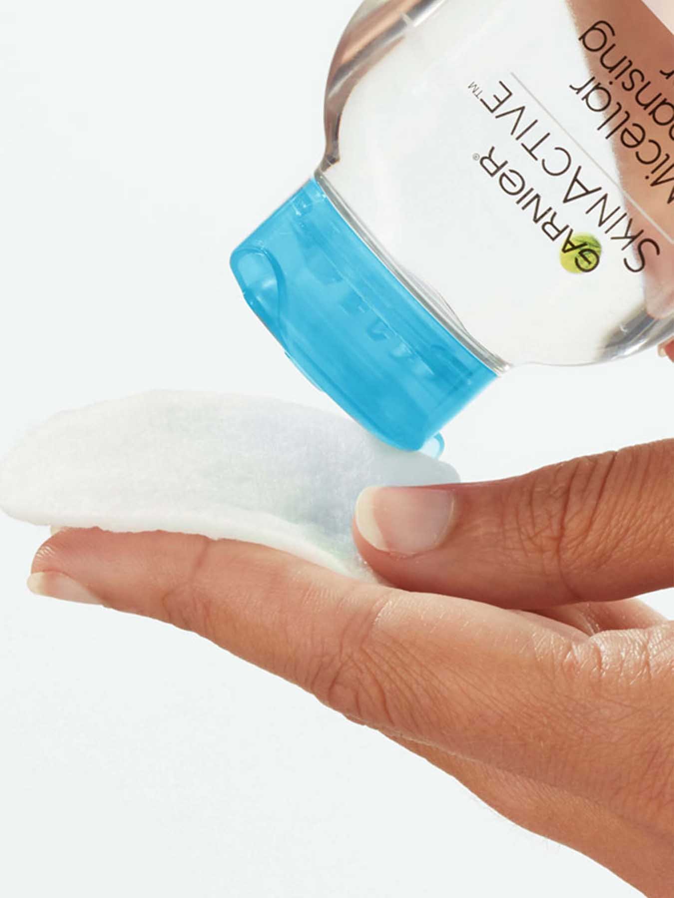 In Use view of Blue Cap Cleansing Water All-in-1, All Skin Types.